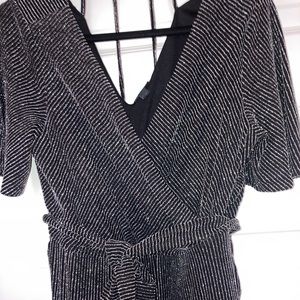 Elegant romper . Worn only once